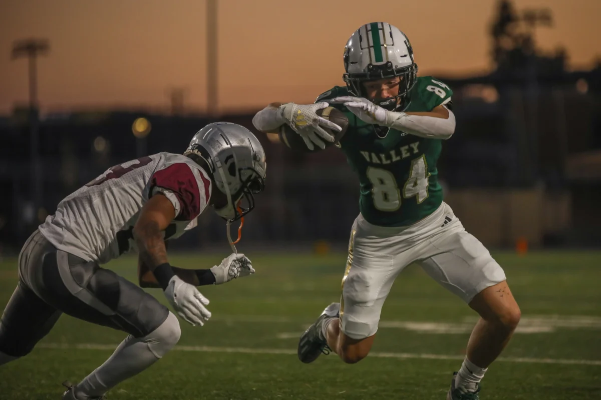 Freshman wide receiver Ben Baker rushed to make a touchdown at the 20-yard line.