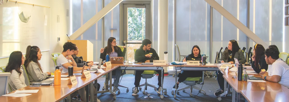 ASU Council members Jazmine Balbuena, Arely Aguilar, Allan Maldonado, Garnik Arustamyan, Gianella Urtecho, Christopher Robles-Garay, Ammy Duarte, ASU Advisor and Counselor Monica Flores, Sofia Orellana Rivas, Natalie Castillo, and Julian Serrano during their bi-weekly meeting on the secoond floor of the Student Union Building on March 12.